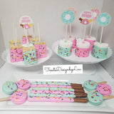 Donuts themed treats bundle candy table.